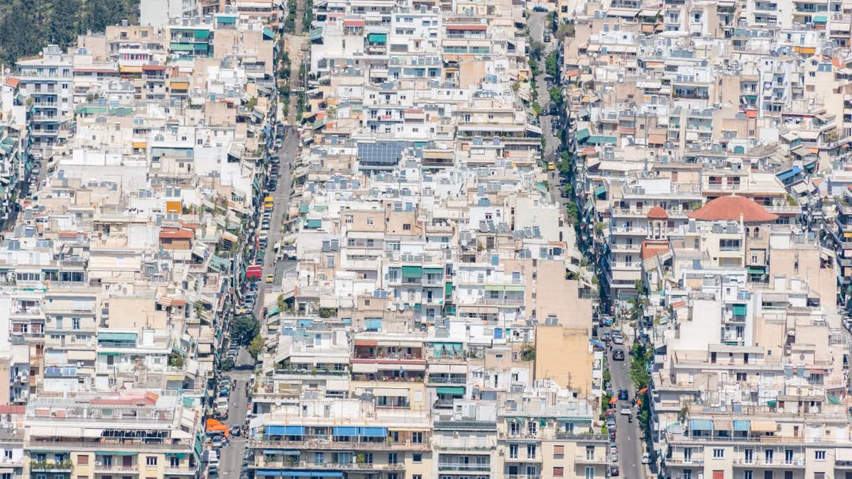 Aerial perspective showing the dense urban landscape of Athens, Greece.